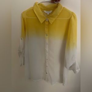 Shirt, slight stain on front not noticeable